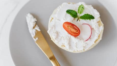 Two die and dozens ill after eating contaminated cheese