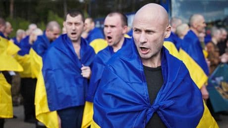 Hundreds of Ukrainian and Russian soldiers and civilians released in biggest prisoner swap of war