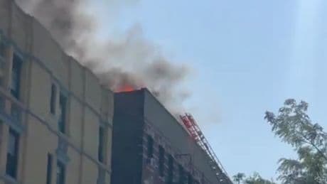 Parts of Manhattan covered in black smoke after apartment fire leads to massive emergency response