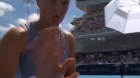 Wimbledon champion Iga Swiatek asks cameraman to stop filming as she changes clothes on court