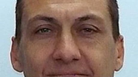 Australian authorities offer $1m bounty for fugitive gunman who shot dead two police officers