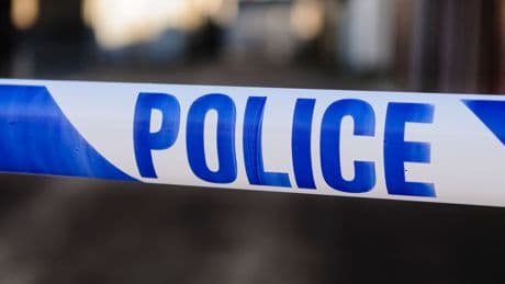 Man dies after tractor drives through field and crashes into parked cars