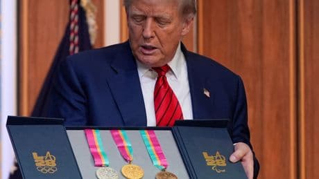 Trump gets more sports medals he didn’t earn as his collection grows with Olympic triumphs