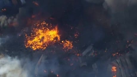 Aerial footage shows scene of devastation after huge explosion at fireworks warehouse