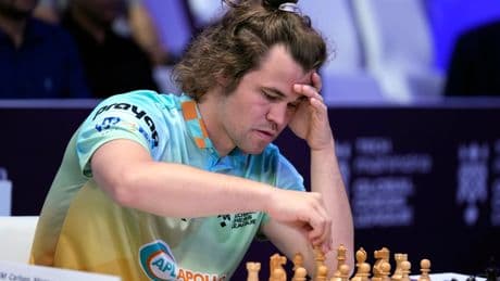 Chess grandmaster Magnus Carlsen is forced into a draw in a showdown against ‘the world’
