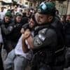 Far-right marchers attack Palestinians as Israel marks taking of Jerusalem