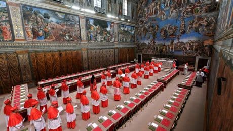 Cardinals returning to conclave after first vote ends in black smoke