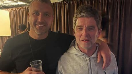Gangster Robert Kelbie hangs out Noel Gallagher backstage at Oasis tour