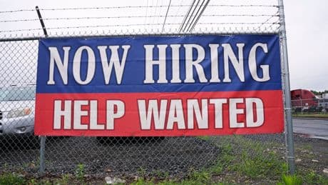 Fewer Americans sought unemployment benefits last week as layoffs remain low