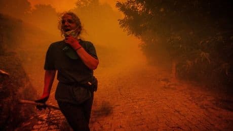 Former mayor dies trying to save town from wildfires sweeping southern Europe