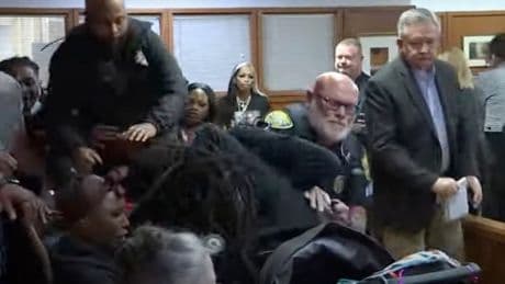 Watch moment massive courtroom brawl erupts as mom of murdered teen, 14, confronts his killer’s family