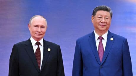 China and India discuss disputed border at key summit - as Putin talks about Trump