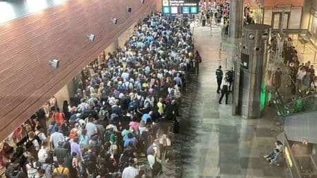 Madrid airport chaos LIVE: Police break up 'fights' as passport control collapses in Spain