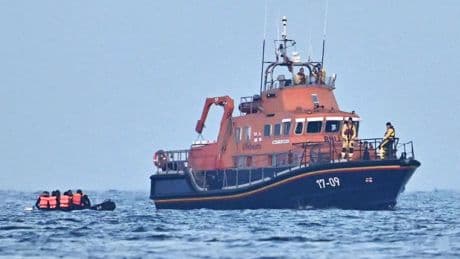 Tragedy as migrant dies after small boat sinks trying to cross Channel with mum & child among 62 pulled from water