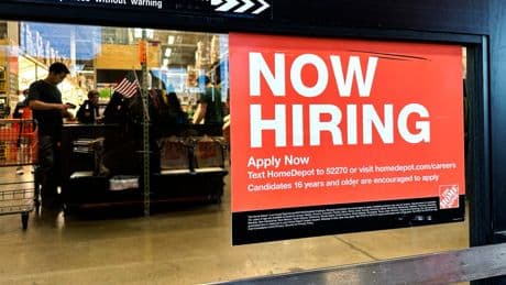 US applications for jobless benefits rise modestly, but remain in a range considered healthy