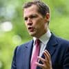 Refugee charity boss who accused Robert Jenrick of 'xenophobia' in BBC row says top Tory should work with him to 'de-escalate fear and anger' over small boats crisis