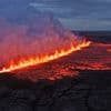 Tourists and residents evacuated as volcano erupts on Iceland, with magma bursting through half-mile-long fissure