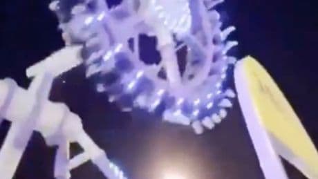 Spinning theme park ride snaps in mid-air before crashing to the ground