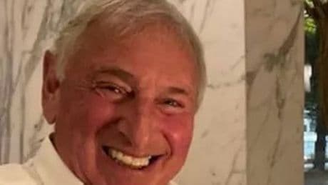 Woman, 70, charged with murder after 'well-mannered' man found dead at property
