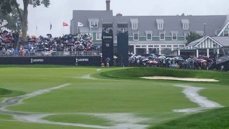 US Open suspended with course unplayable as Brooks Koepka sprints inside