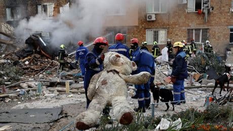 Twelve killed in Russian attack on Kyiv as Volodymyr Zelensky reiterates need for 'new, tough sanctions' on Moscow