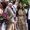 Shocking moment Queen Mary winces in pain and begins limping before being rushed indoors - cutting short official appearance in Denmark