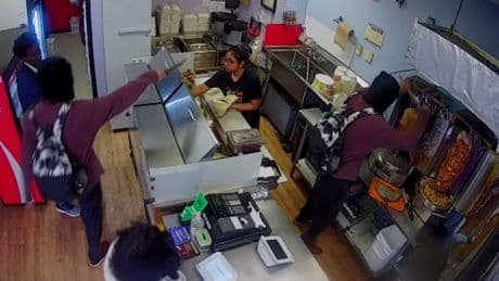 WATCH: Robber uses machete to terrify donair shop staff before shaving himself some meat