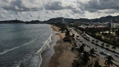 Erick strengthens into a Category 3 major hurricane approaching Mexico's coast