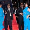 Under her umbrella: zwangere Rihanna trotseert trots de regen op de rode loper in Cannes