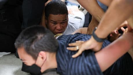Masked agents launch sweeping immigration raids in LA and New York