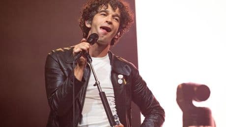 Matty Healy of The 1975's 'car crash set' leaves Glastonbury crowd divided