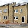Our neighbour built TWO homes without planning permission... we're going to sit there with popcorn when they got bulldozed