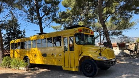 We bought old school bus on eBay & transformed it into family travel wagon – it has bunk beds, fridge & washing machine