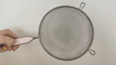 I Tried TikTok's Spoon Trick To Clean My Sieve, And I'm Never Going Back