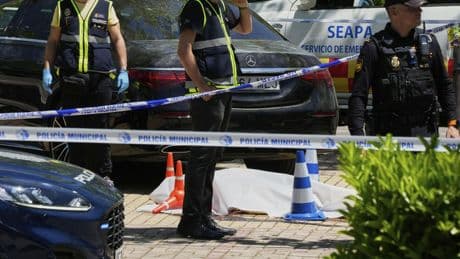 An adviser to an ex-Ukrainian president is killed near an American school in Spain, officials say