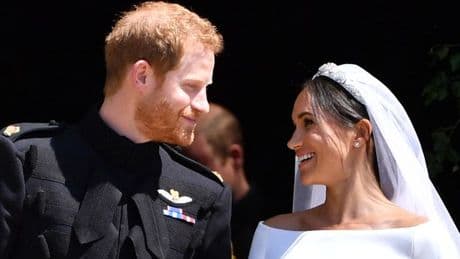 Prince Philip 'whispered four brutal words' to Queen at Harry and Meghan's wedding