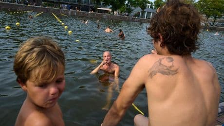 Surrounded by water, Dutch swimmers have plenty of places to cool off