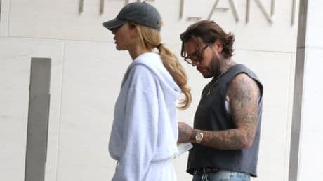 Olivia Attwood and Pete Wicks look sombre as they take a smoke break together