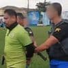 Soccer referee sensationally arrested DURING match and hauled off field in handcuffs