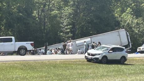 Multiple passengers are dead and several trapped in New York tour bus crash