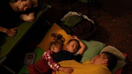 By day, the Ukrainian capital is alive and humming. By night, it’s a battleground