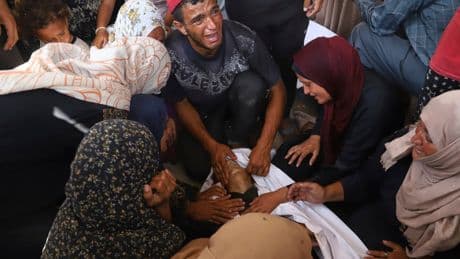 At least 51 Palestinians killed while waiting for aid trucks in Gaza, health officials say