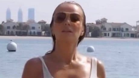 Amanda Holden stuns in cut-out white bikini as she matches daughter Lexi, 19