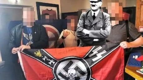 Neo-Nazis celebrate Adolf Hitler's birthday in UK pub with racist flags and swastika cake