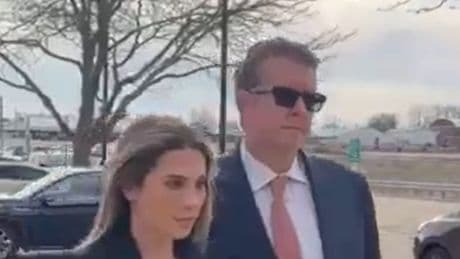 Watch ‘perv’ teacher Christina Formella arrive at court with husband by her side…as she’s accused of molesting teen boy