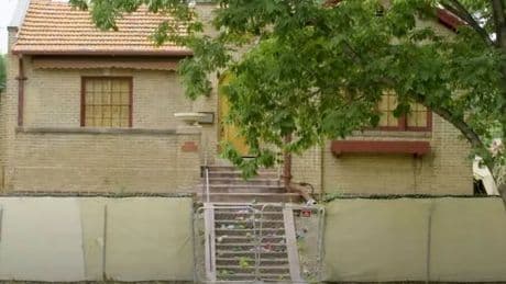 Fuming neighbours forced into disgusting 'poo' row over abandoned home