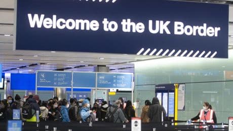 Net migration HALVES from record high to 431,000 – but Keir Starmer is warned numbers are STILL far too high