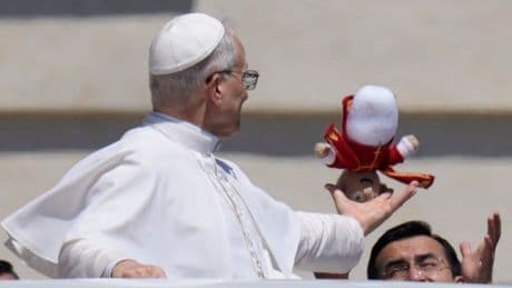 Pope’s catch of curious gift thrown from crowd sparks admiration and concern