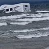 Two camper vans and a VW Beetle are submerged by the waves on Welsh beach within days of each other after owners 'ignored warnings of fast tide'