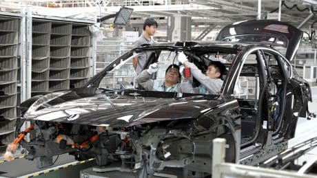 China's economy surges, but tariffs effect is yet to be seen